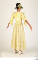  Photos Woman in Historical Civilian dress 1 19th century Historical Clothing a poses whole body yellow dress 0006.jpg